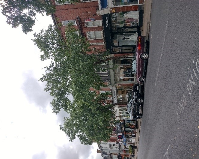 Figure 27 Red brick shopping parade with street trees