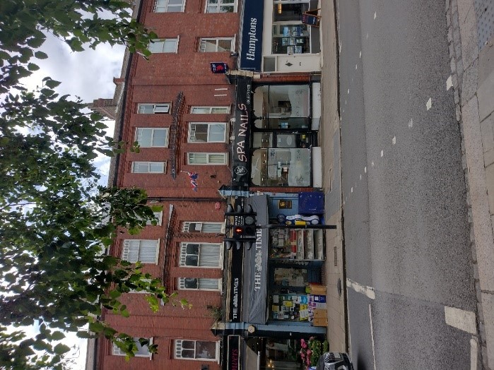 Figure 35 View of 8-12 High Street with a mixture of traditional and modern shopfronts