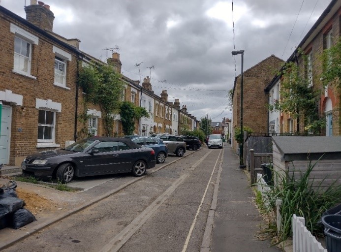 Figure 68 View of the eastern side of Watts Lane showing the loss of front gardens to car parking