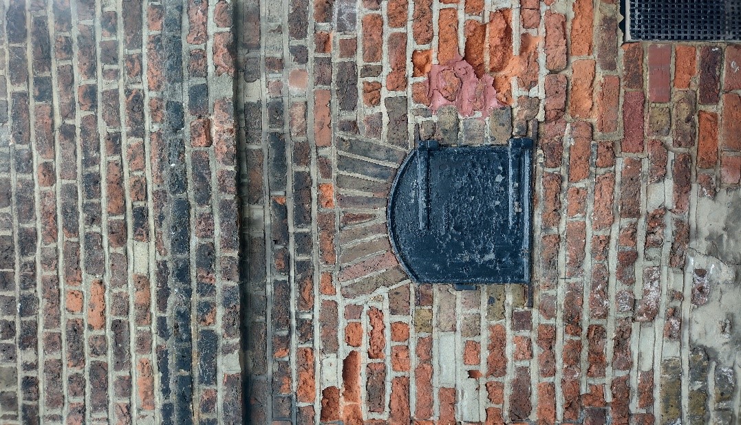 Figure 82 Wrought iron hatch door on exterior of Elmfield House