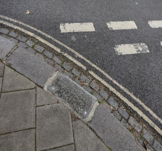 Figure 119 Example of poor repair to good quality granite kerbs