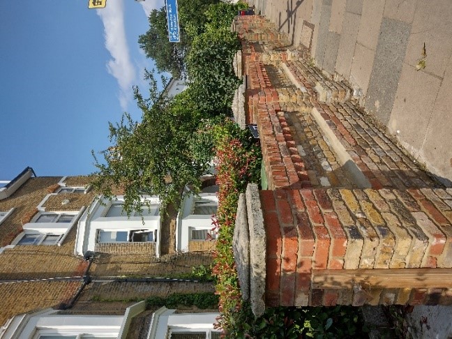 Figure 40 brick front boundary walls intact