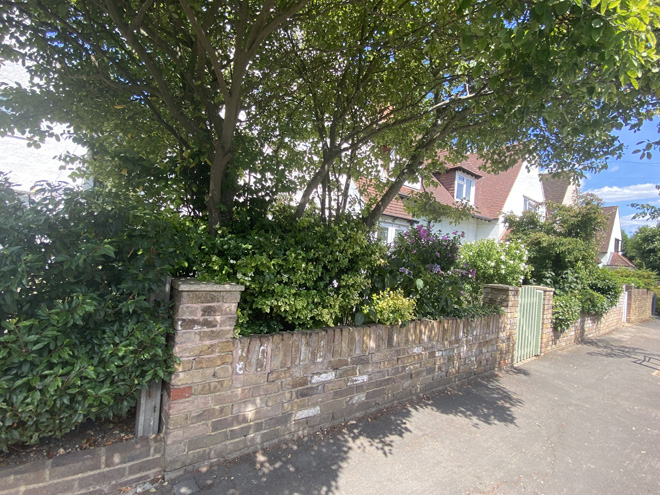 Figure 16 Brick boundary wall outside 100 Connaught Road