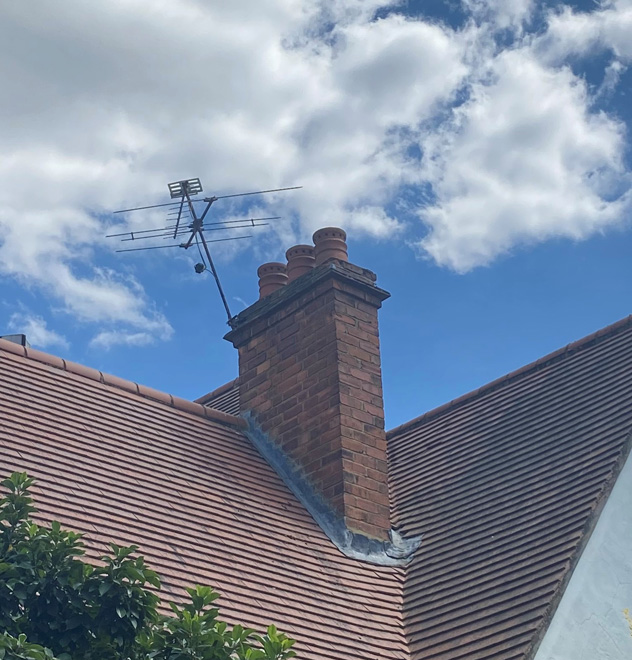 Figure 37 Example of chimney set into the valley between the main roof and gable