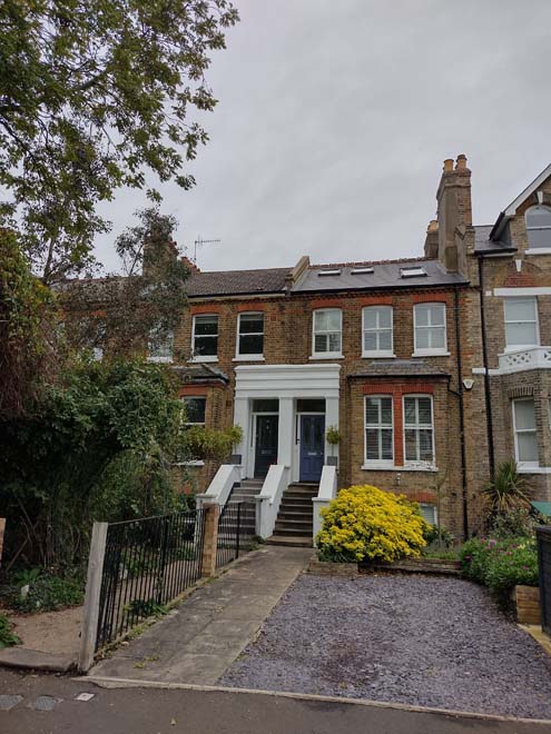 Fig. 59: Another door typology to Queen's Road, the upper gorund floors accessed by simple stairs generally with low walls between