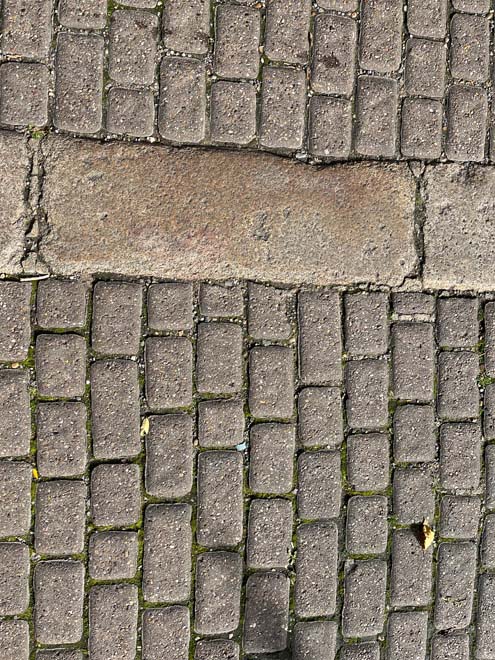 Fig. 126: Later sections of brick survive along Church Lane toward the village centre