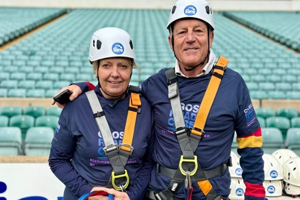 Local couple zip-wire across Allianz Stadium for Crossroads Care